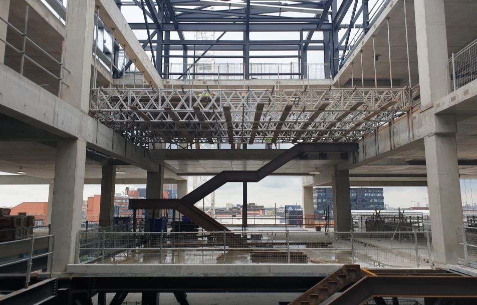 Image of a new building midway through construction