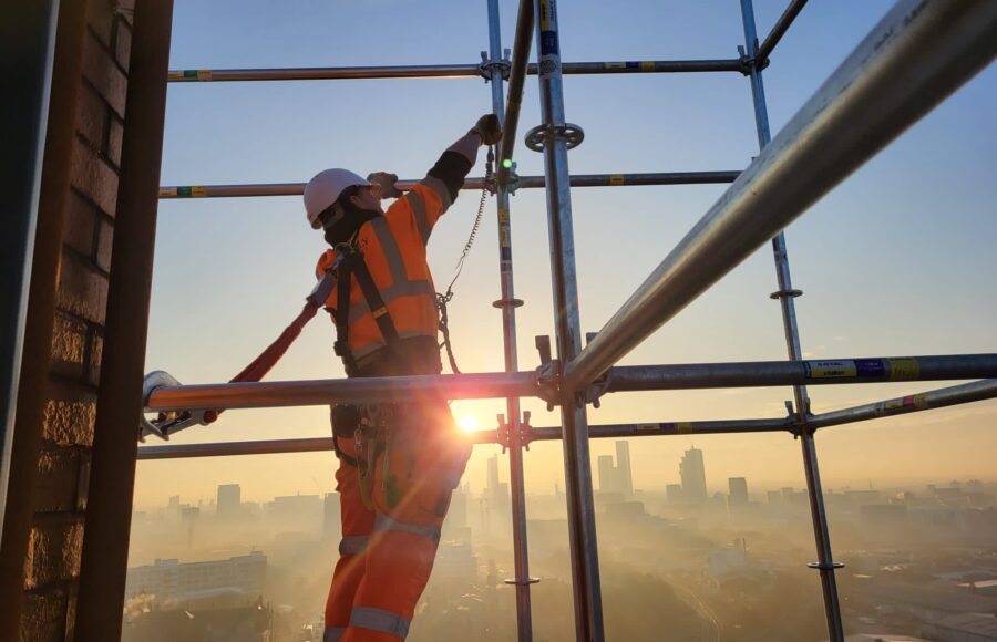An image of Thorn Court in Salford, covered in scaffolding.