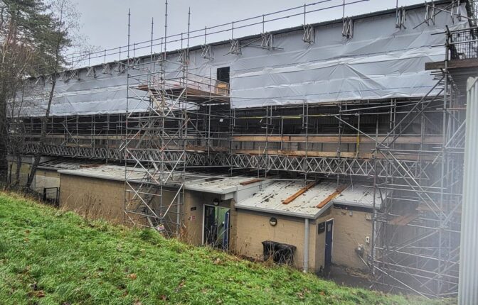 An image of Beechen Cliffe School under scaffolding.