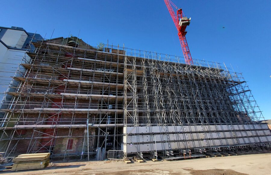 An image of Heaps Mill in Liverpool covered in scaffolding.